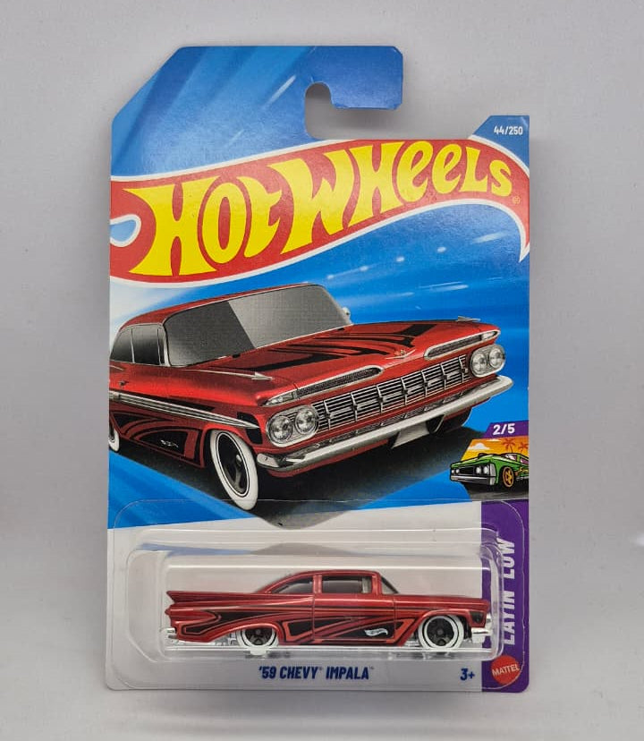 Hot Wheels toy car in packaging with red car and blue and yellow Hot Wheels logo.