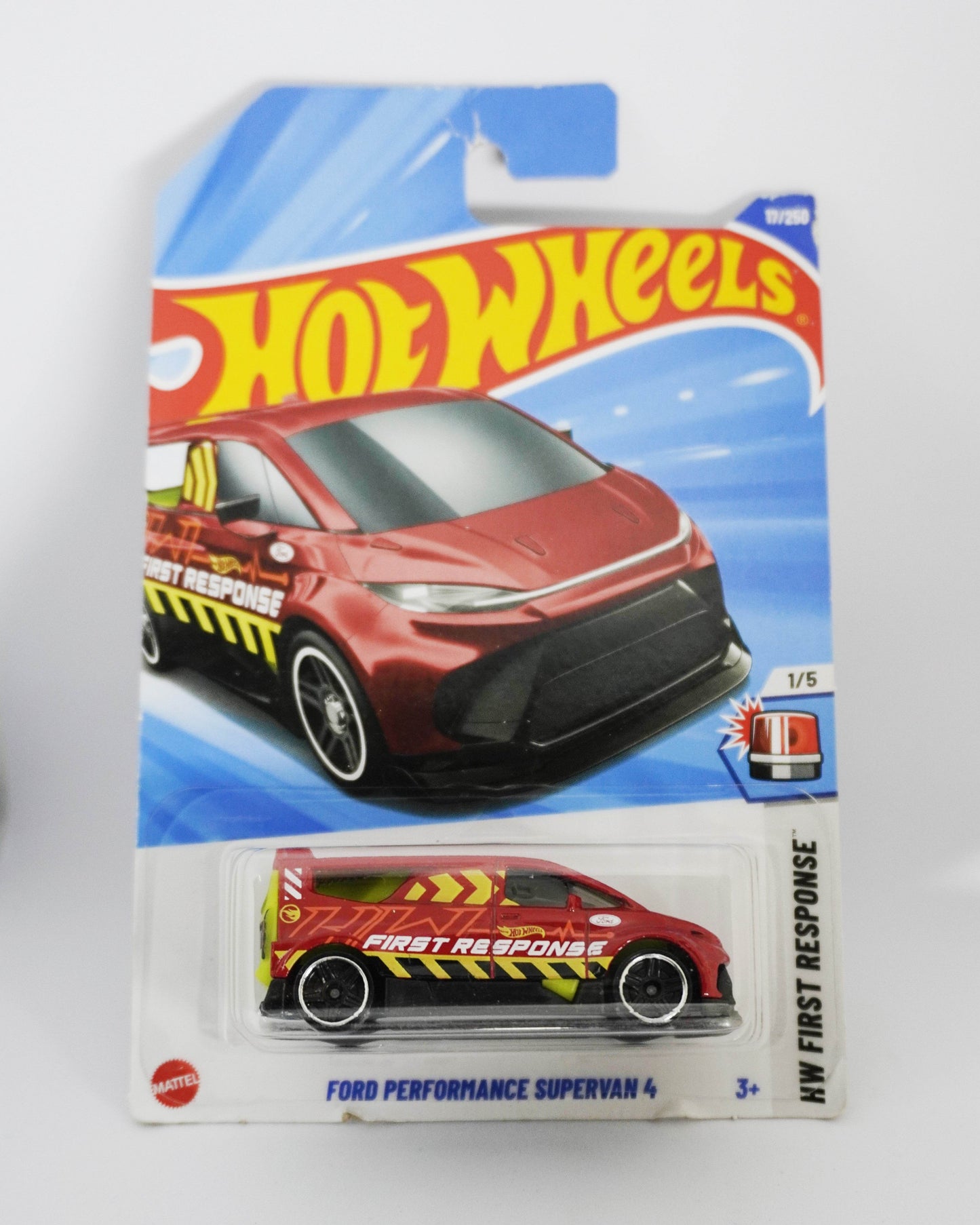 Hot Wheels toy car in packaging with a red and yellow 