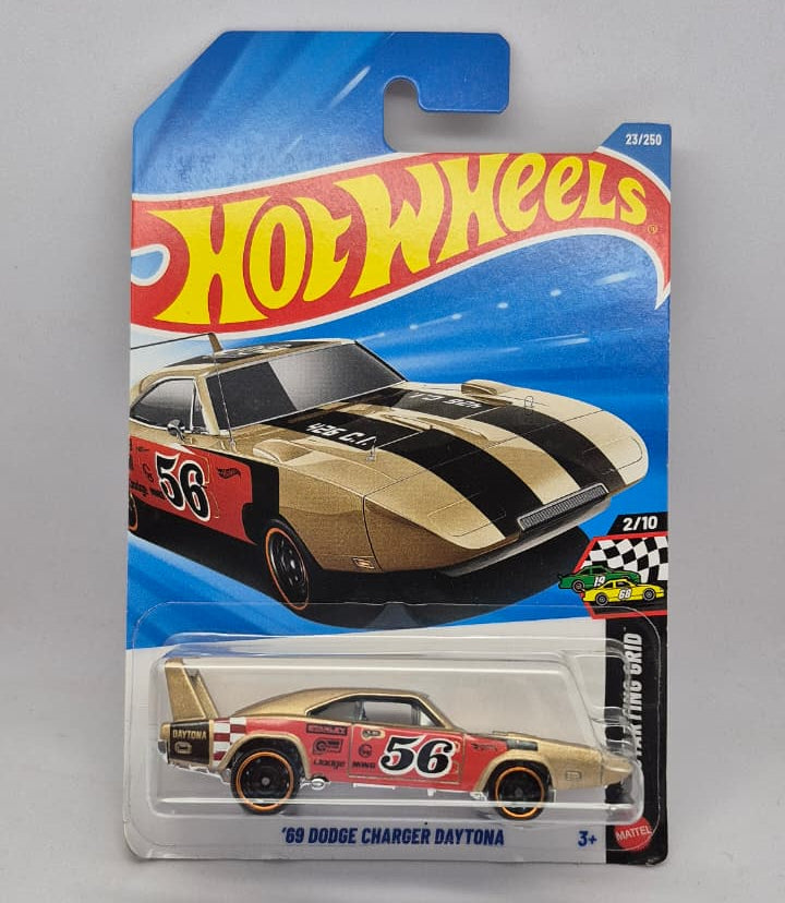 Hot Wheels '69 Dodge Charger Daytona toy car in packaging on a gray background