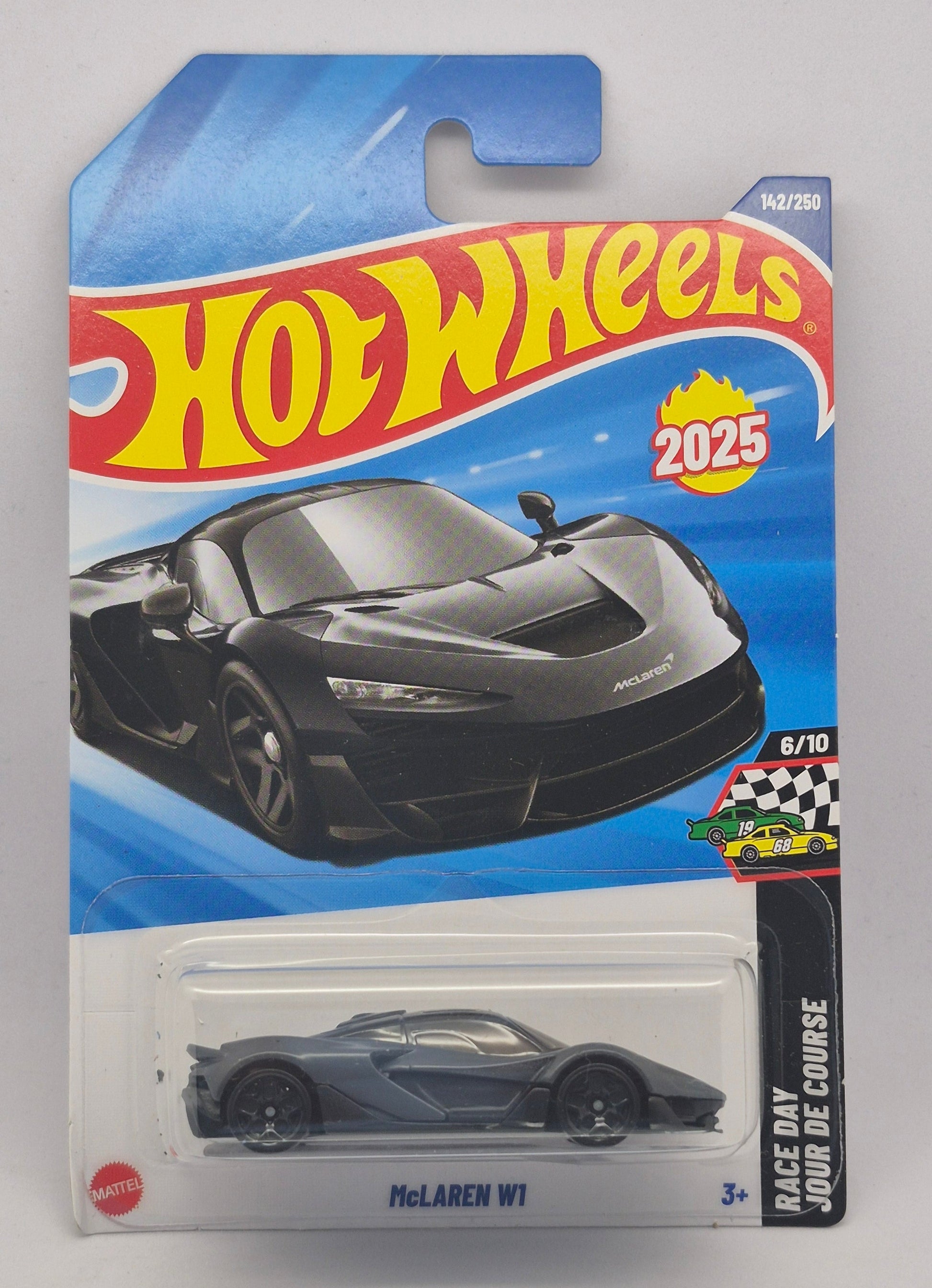 Hot Wheels toy car in packaging on a gray background
