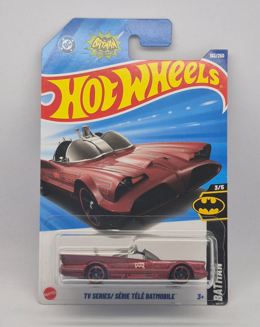 Hot Wheels toy car in packaging with Batman logo on a gray background